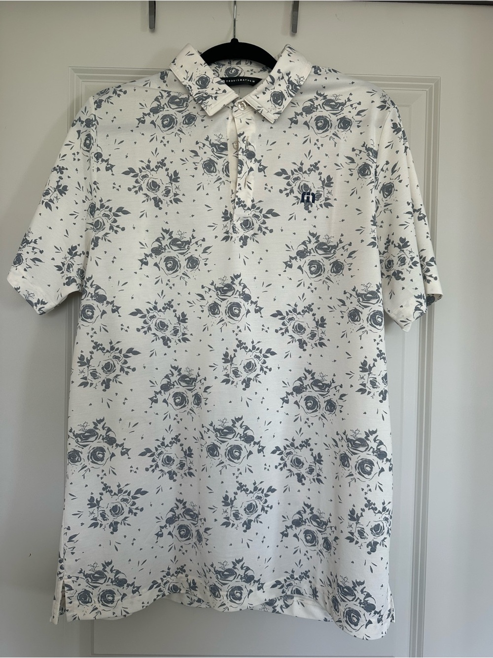 Travis Mathew White Polo with Gray Floral Print